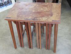 A mid 20thC Scandinavian nest of tables designed by Poul Hundevad for Novy Domov c1960s,