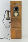 A late 20thC Astral England wall telephone (a/f).