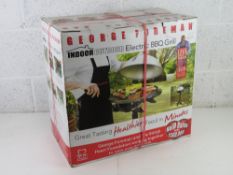 A George Foreman Electric BBQ grill, as new in box, unopened.