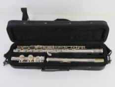 An Elkhart flute (by Vincent Bach International 100FLE) in original fitted case.