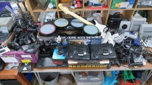A vast quantity of video gaming equipment and consoles including Sega mega drive, Sega controllers,