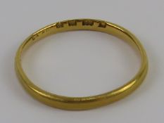A 22ct gold band, size P, 1.7g.