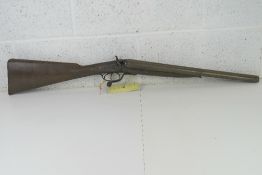 A deactivated Mortimer 12 bore shotgun.