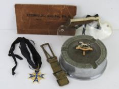 A quantity of assorted militaria includi