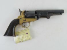 A reproduction deactivated Colt Navy .36