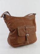 A tan leather handbag by Clarks approx 34cm wide.