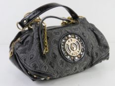 A Baby Phat handbag approx 28cm wide.