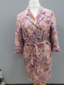 A ladies floral long length jacket by Kew size 12, 53% linen, approx measurements; 40