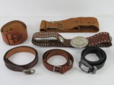A quantity of assorted belts inc River Island tan leather and Top Shop black studded,