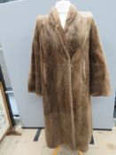 A vintage fur coat, approx measurements; 40