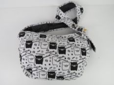 A cross body fabric bag having pig themed pattern 'as new', approx 40 x 24cm.