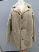 A men's sheepskin coat, size 46, approx measurements; 50
