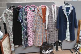 A large quantity of vintage c1960s-80s clothing inc black 1960s A-line dress with pan collar,