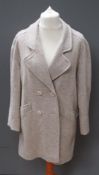 A pure new wool cream and beige coat, approx measurements 42