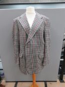 A men's jacket by Burton in black/red/green check, woollen fabric, approx measurements; 46