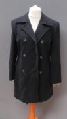 A 65% wool, 20% cashmere black coat by Whimsy, approx measurements; 39