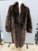 A vintage faux fur coat, approx measurements; 42