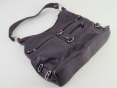 A purple leather handbag by Smith Conova, wear noted to corners, approx 37cm wide.