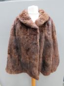 A vintage fur shawl, no apparent labels.