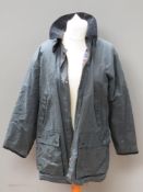 A 100% cotton waxed jacket by Country Collection for M&S, size Medium to fit 36-38