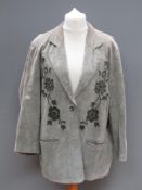 A green suede jacket having floral pattern upon by Beth Terrell, approx measurements; 48
