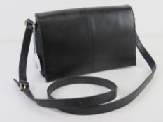 A vintage black leather cross body handbag approx 26cm wide.