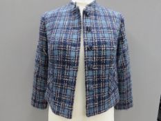 A blue tweed jacket designed and made by Rosemarie Van Bree, approx measurements; chest size 34