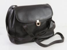 A brown leather handbag by Tula approx 28cm wide.