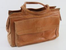 A vintage tan leather handbag having suede lining approx 34cm wide.