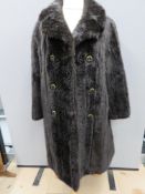 A vintage faux fur coat, approx measurements; 42