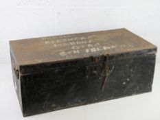 A black painted metal trunk.