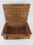 A wicker hamper measuring 52 x 37 x 19cm.