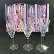 Edinburgh crystal; a set of four champagne flutes in original boxes, spare loose flute.