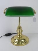 A 'banker's' brass table lamp with green glass shade, untested, for re-wiring.