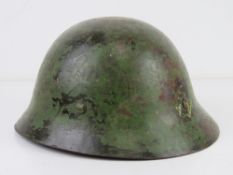 A WWII Japanese Pacific Marine helmet.