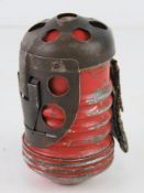 An inert WWII Italian M35 Red Devil Gren