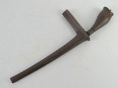 A Kris knife with scabbard.