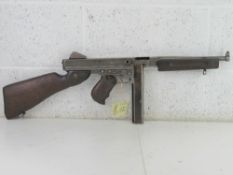 A deactivated Thompson M1A1 SMG, latest