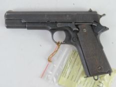 A deactivated Norwegian Kongsberg 1911 .