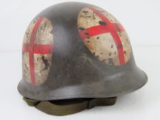 A US M1 Medical helmet with liner, sweat