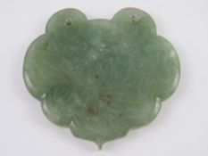 A jade pendant panel having engraved floral decoration with four character marks verso, 5.5cm