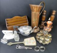 A tall copper jug together with a quantity of assorted items including turned wooden candlesticks,