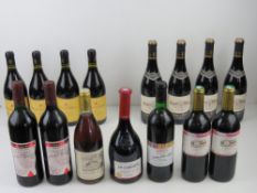 Cotes Du Rhone; Four bottles of red wine. Together with eleven other assorted bottles of red wine.