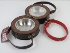 A Disney Mickey Mouse dog collar together with a leatherette dog bowl travel case opening to