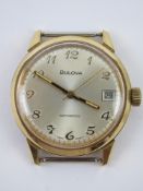 A Bulova Automatic wristwatch having champagne dial and date aperture.