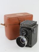 A Rolleicord by Franke & Heidecke Braunschweig in leather case having United States customs