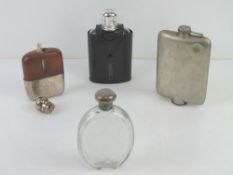 An HM silver topped cut glass flask 13.