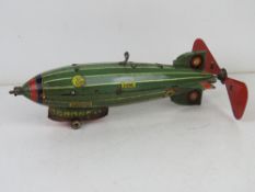 A tin-plate model Zeppelin airship, marked Aeronave Miniatura, 23.5cm