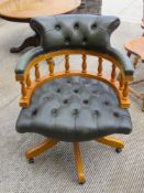 A contemporary green button back studded Captain's type office desk chair. Bolts removed for