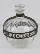 A 1920's American bottle for Bustanoby Freres N.Y. 'Forbidden Fruit'; an unusual glass orb having